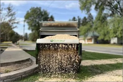Sand-Spreading-Action-Earth-Turf-scaled (1)