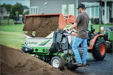 410-Loading-with-Front-Loader-Topsoil-Spreader-Kubota-scaled