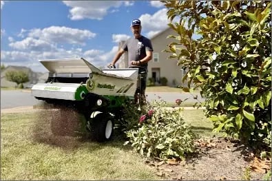 Compost-Topdressing-Fescue-Around-Flower-Beds-1-scaled