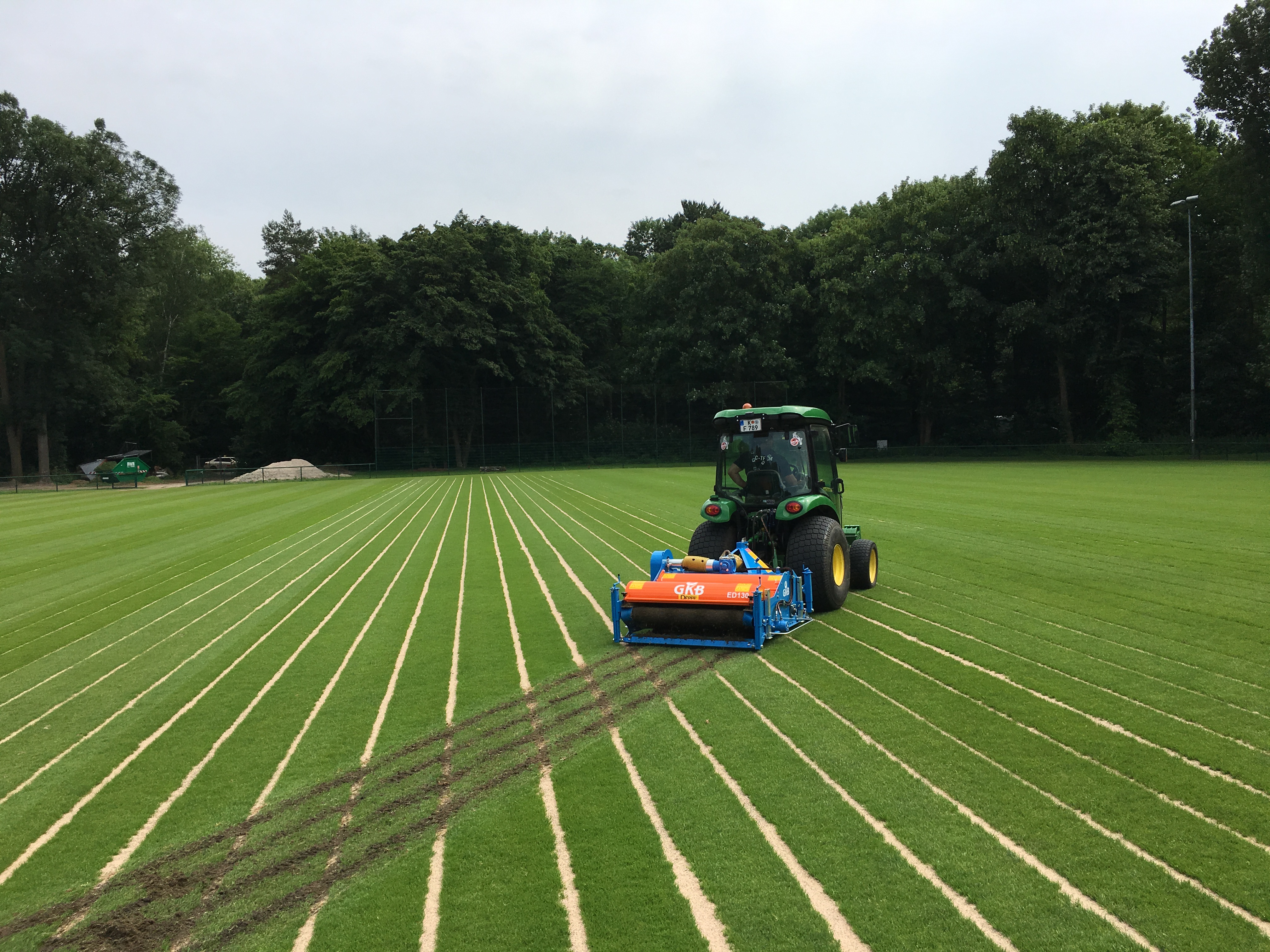 Tractor cleaning turf