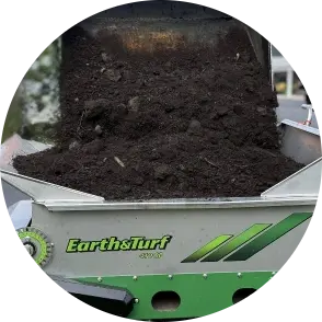 Loading-a-Stand-on-410SP-Topdresser-Compost-Spreader-in-Massachusetts-edited-1-scaled